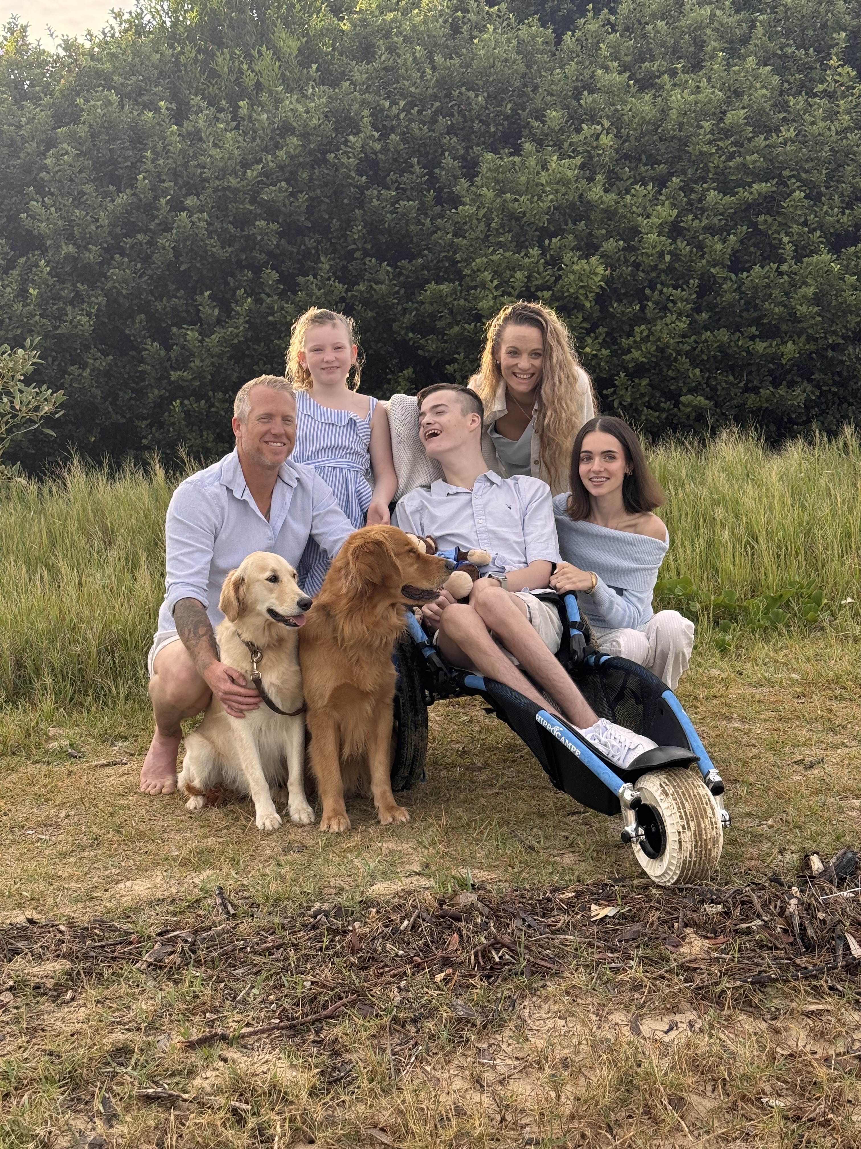 The SCL Support Services family together outdoors on the Coffs Coast